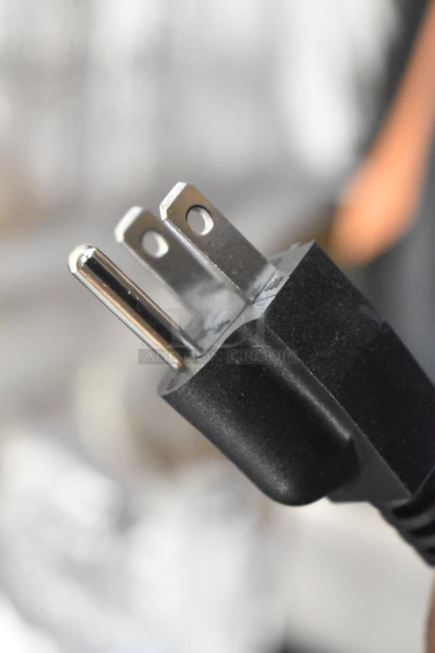 Close-up of AvaMix immersion blender power plug; 2-prong design for 120 volts, heavy-duty construction.