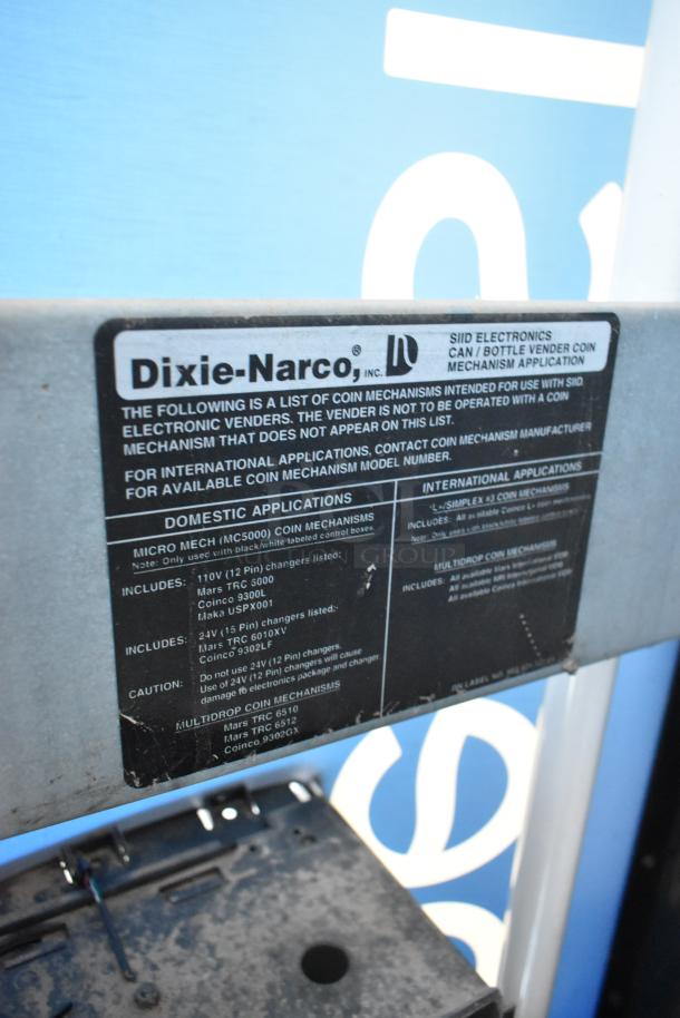 Dixie-Narco DN600E-MC/SII-9 vending machine label, detailing coin mechanisms and electrical specifications.
