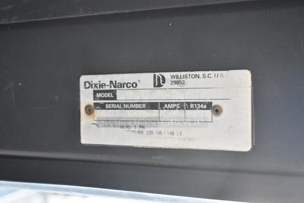 Dixie-Narco DN600E-MC/SII-9 vending machine label, showing model, serial number, and operating specifications.