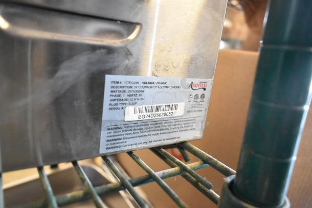 BRAND NEW Avantco 177EG24N Stainless Steel Flat Top Griddle, 208/240V, 1 Phase. Scratch and dent condition, visible label.