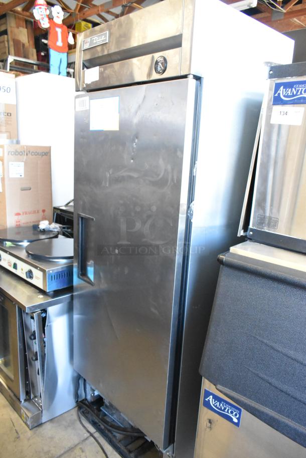 2017 True T-19F stainless steel commercial reach-in freezer, single door, poly coated racks, 115V, 1 Phase, visible wear.