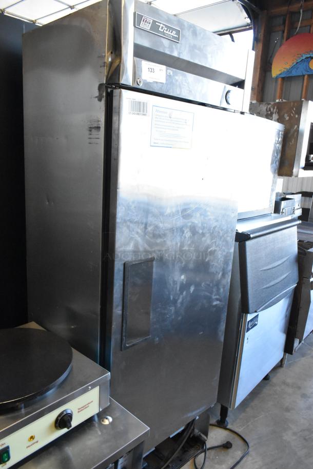 2017 True T-19F stainless steel commercial freezer, single door, poly-coated racks, 115V, 1 phase, visible True logo.