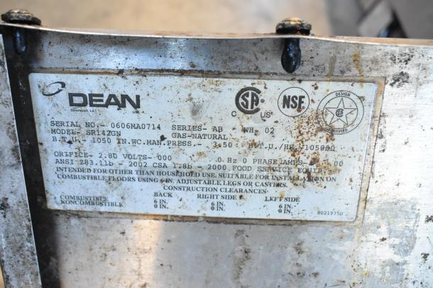 Dean SR142GN stainless steel commercial gas deep fat fryer label, showing model, 105,000 BTU, CSA and NSF certifications.