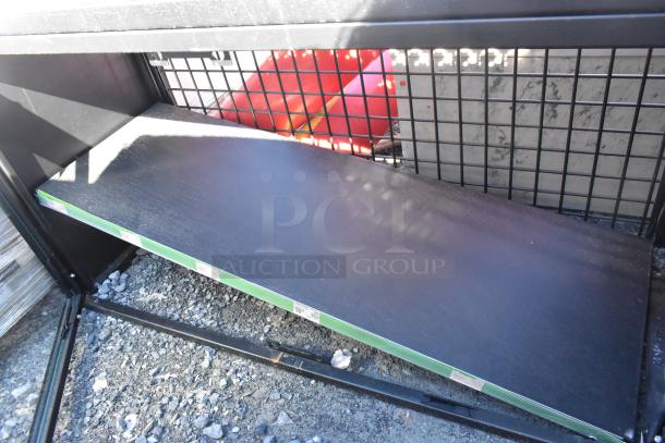 Metal 2 Door Cabinet with mesh panels, black finish, minor wear, suitable for storage. Tags indicate price and item code.