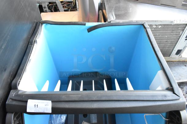 Brand new Manitowoc D400 30" stainless steel ice bin, 365 lbs capacity, visible minor scratches and dents.