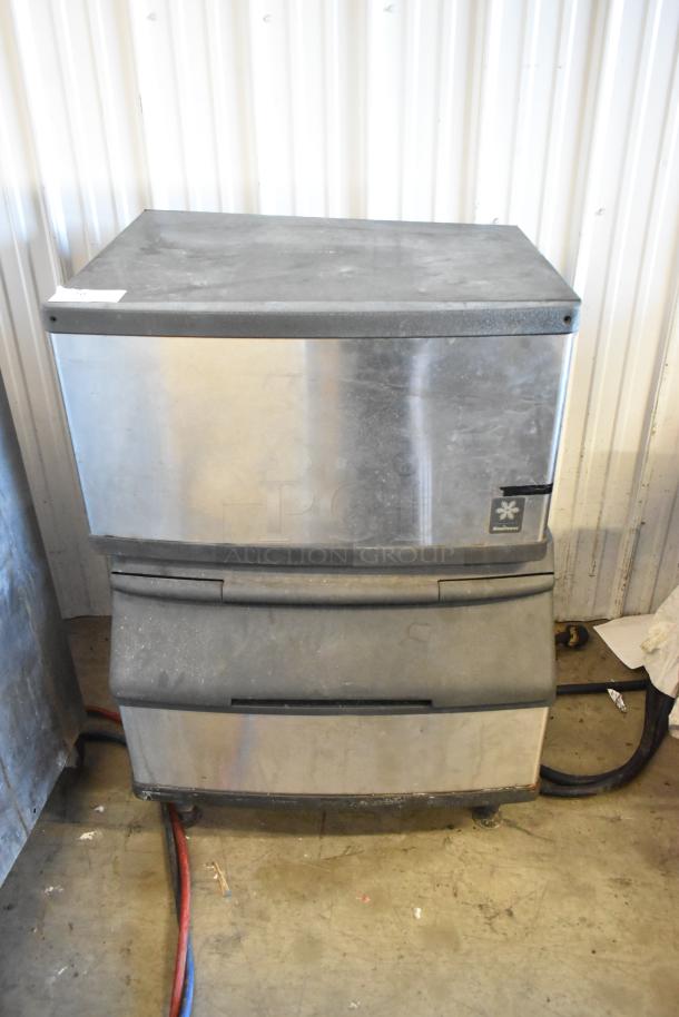 Manitowoc QD0282A stainless steel ice head on Manitowoc S170 bin, 115V, 1 phase, used condition, industrial setting.