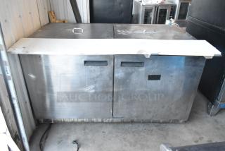 Delfield 4460N-24M-QZN stainless steel commercial prep table, 115 volts, 1 phase, dual doors, some surface wear.