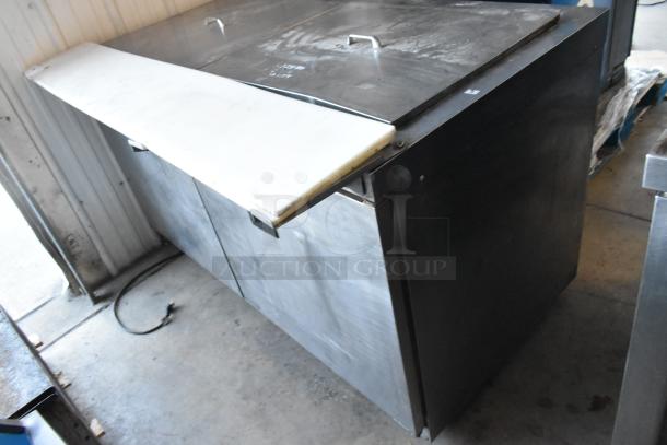 Delfield 4460N-24M-QZN stainless steel commercial prep table, 115 volts, 1 phase, with visible surface wear.