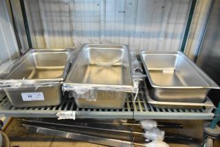Brand new stainless steel bins and a grease trap, part of 6-piece scratch and dent auction lot.