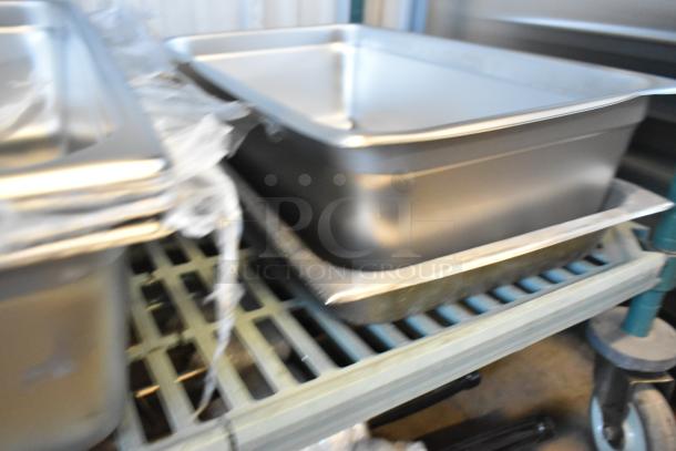 Stainless steel drop-in bins and grease trap, brand new, scratch and dent. Includes 6 items in total.