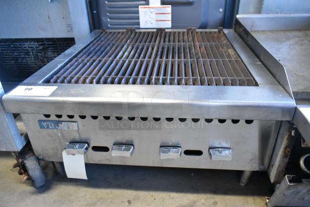 Vulcan stainless steel commercial countertop natural gas charbroiler grill with control knobs, showing mild wear.