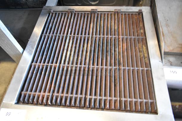 Vulcan stainless steel commercial countertop charbroiler grill, natural gas powered, used condition, visible wear on grates.