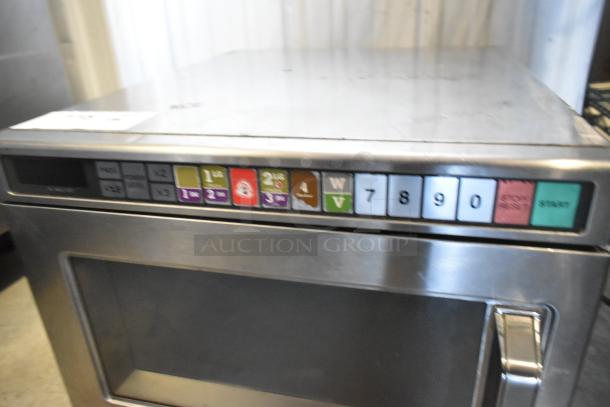 Panasonic NE-1757R Commercial Microwave Oven, 208 Volts, 1 Phase, stainless steel, keypad controls, visible wear.