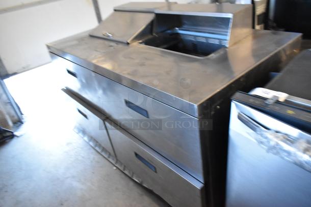 Delfield UCD4464N-12-DD5 stainless steel prep table with 4 drawers, missing 1 lid, 115 volts, 1 phase.