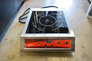 BRAND NEW Avantco 177IC3500 induction range, 208-240V, 1 phase. Countertop model with minor scratches; digital controls visible.
