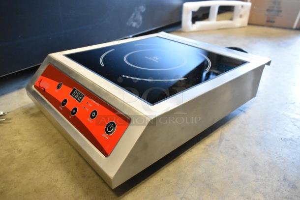 Brand new Avantco 177IC3500 countertop induction range, 2023 model, with minor scratches and dents, 208-240V, 1 Phase.