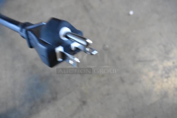 Plug of a 2023 Avantco 177IC3500 Induction Range, 208-240V, 1 Phase, showing a standard three-prong plug.