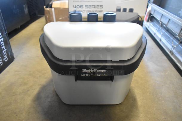 BRAND NEW Liberty Pumps 406 Compact Automatic Drain Pump, 1/6 hp, 115V, with Float Switch. Scratch and dent condition.