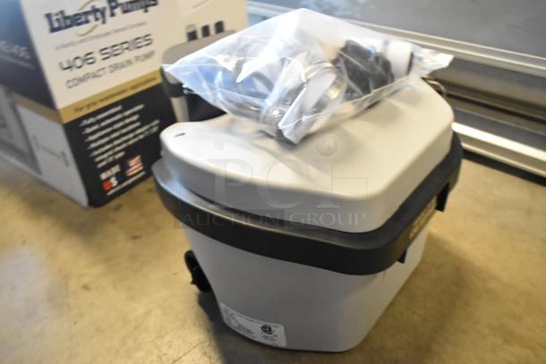 BRAND NEW Liberty Pumps 406 Compact Automatic Drain Pump, float switch, 1/6 hp, 115V, includes installation kit, scratch and dent marked.