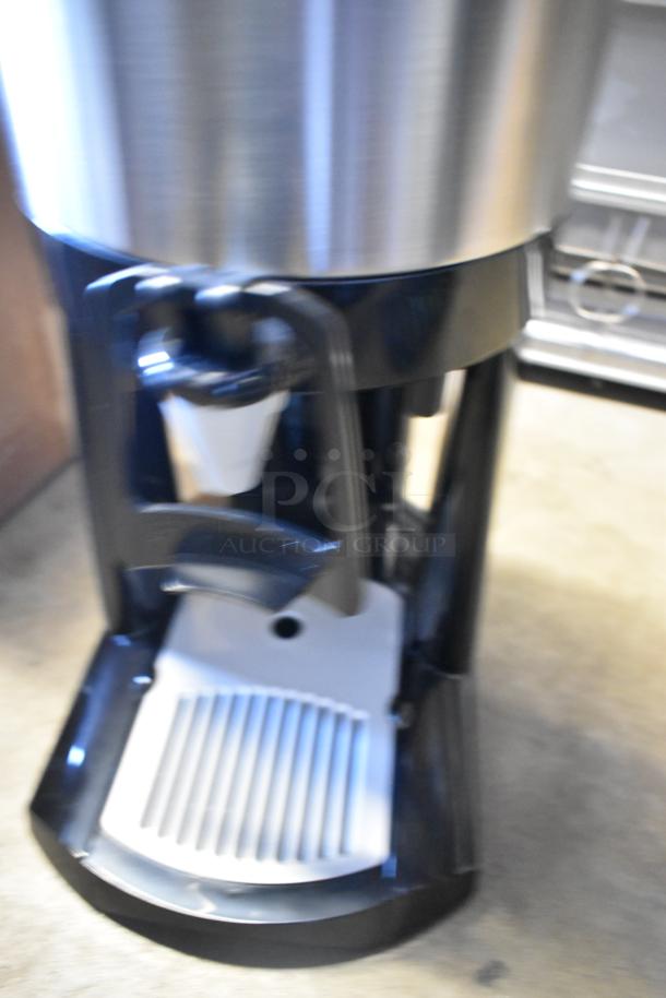 BRAND NEW Fetco L4D-20TLA 2 Gallon Stainless Steel Coffee Dispenser with Stand, Antimicrobial Handle. Scratch and Dent.