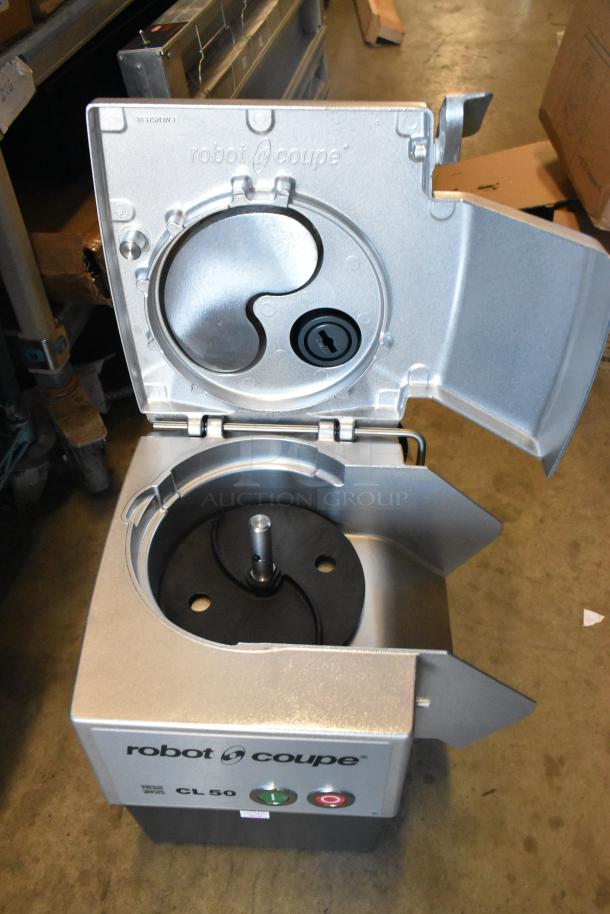 Brand new Robot Coupe CL50 649CL50ND food processor, scratch and dent, no discs, 1.5 hp, 120V, 1 phase, continuous feed.