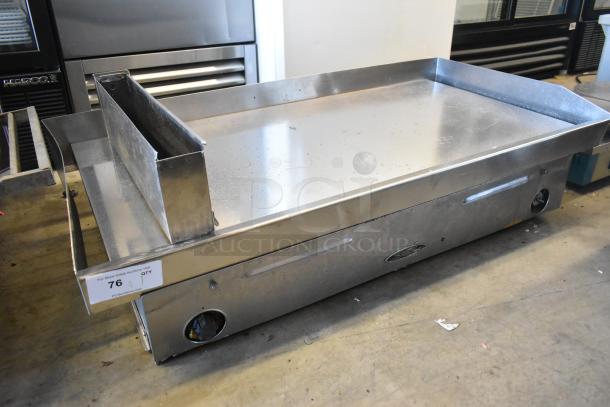 Star Stainless Steel Commercial Countertop Chrome Top Flat Top Griddle in good condition, industrial design.