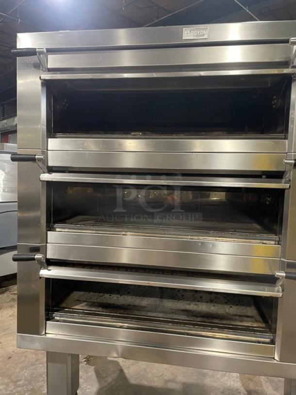 Doyon 2T3 commercial stainless steel electric triple deck oven, 6-pan capacity, digital controls, 208V 3 phase, on casters.