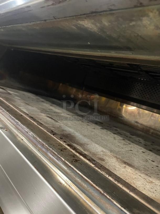 Doyon 2T3 commercial stainless steel electric triple deck oven, six-pan capacity, digital controls, on casters, model 2017.