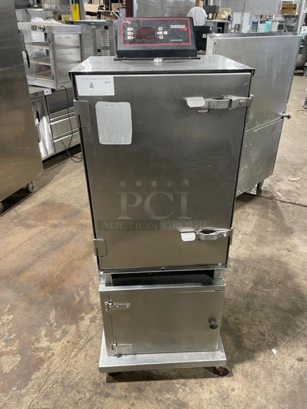 Cookshack SM066 stainless steel electric smoker oven, 2014 model, with digital controls and enclosed base, on casters.
