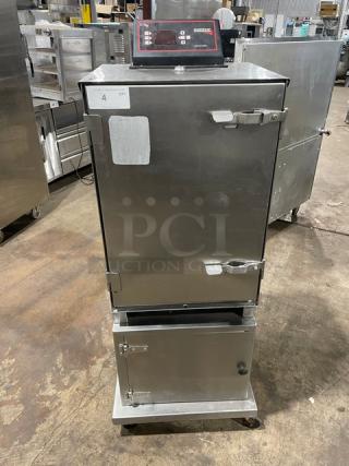 Cookshack SM066 stainless steel electric smoker oven, 2014 model, with digital controls and enclosed base, on casters.