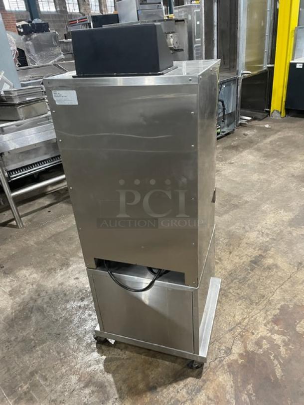 Cookshack SM066 stainless steel electric smoker oven, 2014 model, digital controls, wired rack, dry cabinet base, on casters.