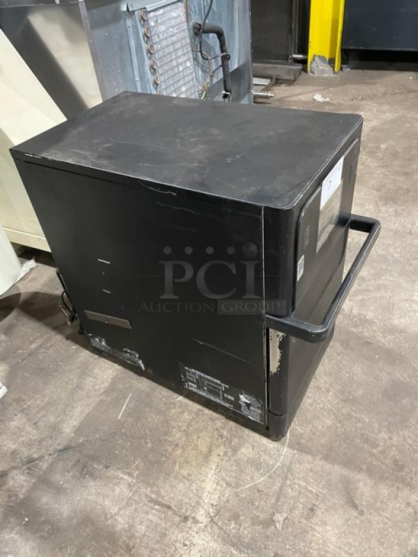 MerryChef Eikon E2S black countertop high-speed oven, electric, 208/240V, gently used, model labels visible.