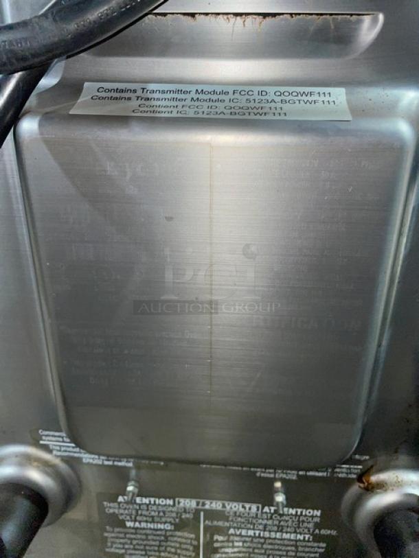 MerryChef Eikon E2S high-speed cook oven, black, countertop model, electric, 208/240V, 1 phase. Features label details.