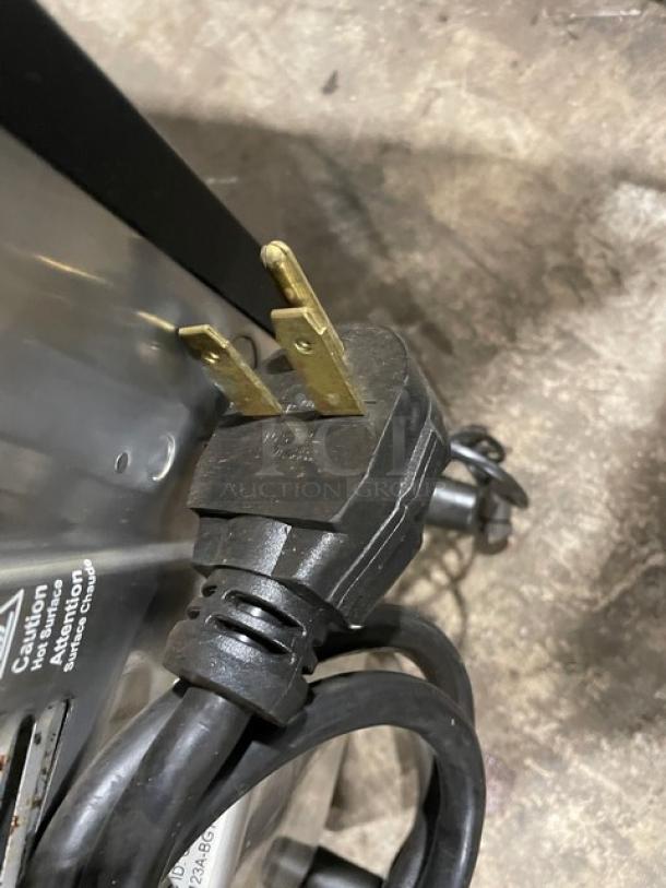 MerryChef Eikon E2S electric rapid cook oven. Black, countertop model, 208/240V, 1 phase. High-speed cooking, compact design.