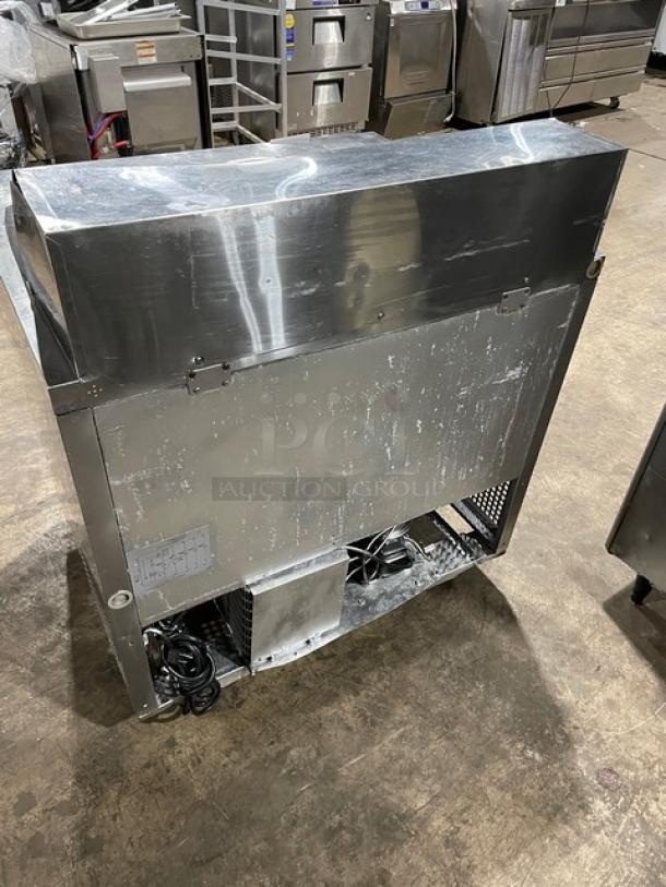 Turbo Air MST-36 refrigerated prep table, stainless steel, dual doors, poly-coated rack, on casters, 115V.