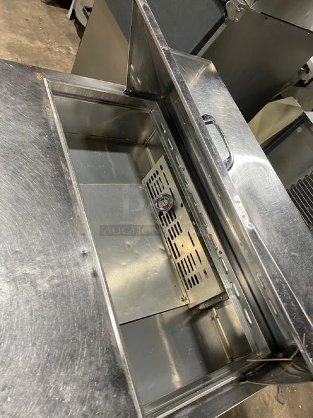 Turbo Air MST-36 refrigerated prep table, stainless steel, two doors, with poly coated rack, on casters, 115V.