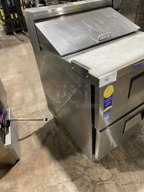 Everest EPBNR1 refrigerated prep table with 2 drawers, stainless steel, cutting board, 115V, on casters, good condition.