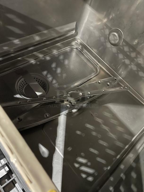 Hobart LXEC commercial stainless steel undercounter dishwasher interior, featuring cup rack. Energy Star certified.