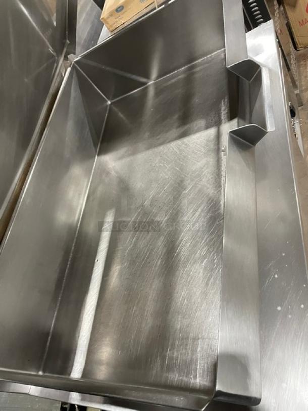 Cleveland Range 48" stainless steel electric tilting braising pan, includes swivel spout faucet, on legs, used condition.