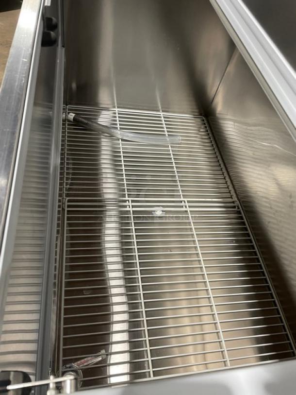 Beverage-Air stainless steel milk cooler, model SM49HC-S-105, features poly coated wired rack inside. Energy Star certified.