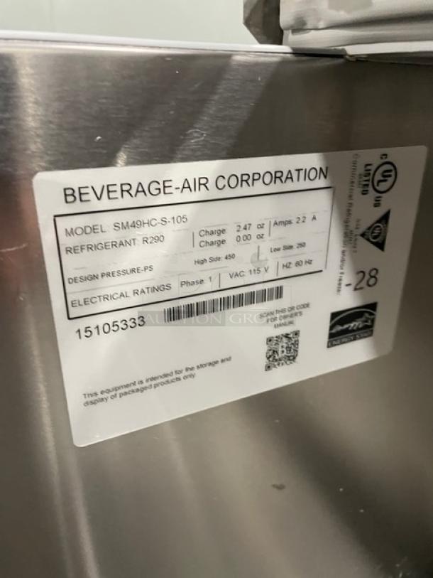 Beverage-Air SM49HC-S-105 milk cooler tag showing model, serial number 15105333, and electrical specifications.
