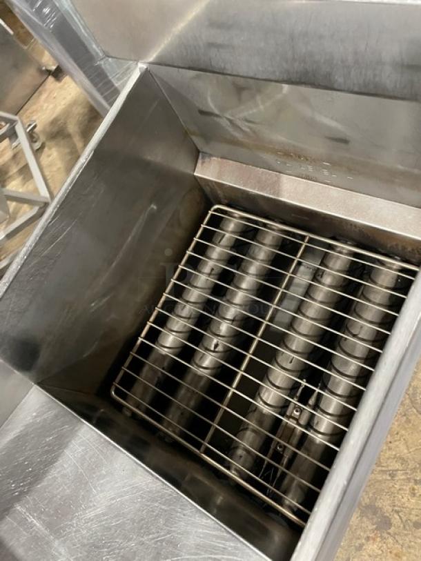 Pitco Frialator 40D commercial deep fryer, stainless steel, natural gas, 40 lb. capacity, with backsplash and basket hanger.
