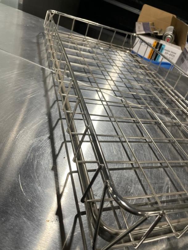 Chrome-plated full-size bagel/pastry wired rack in excellent condition, ideal for commercial use, with sturdy construction.