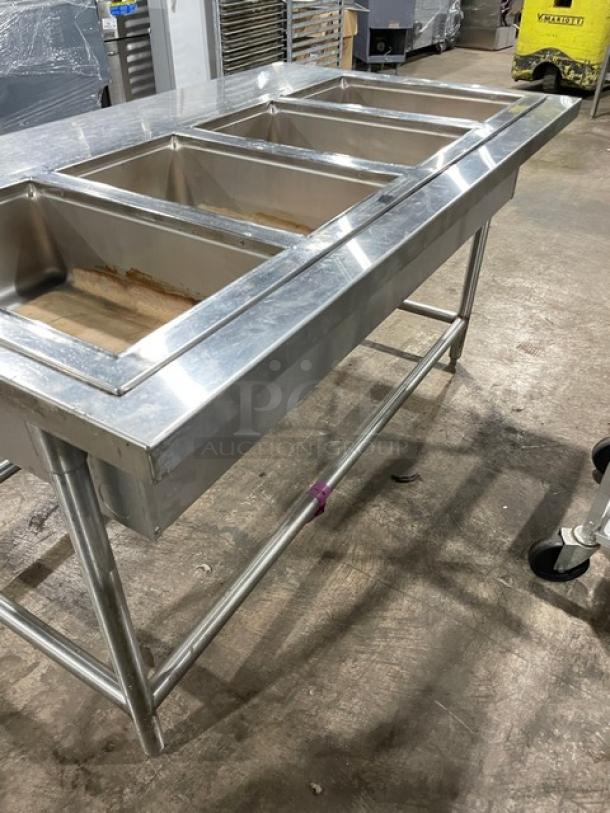 Wells MOD400TDM stainless steel 4-well hot food steamer, electric, top-mount, on legs, 208/240V, used condition.