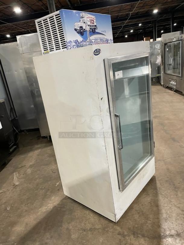 Leer Commercial Ice Merchandiser Freezer, Model 301UC25MG, white, single glass swing door, indoor use, 115V, SN: HAA-0404.