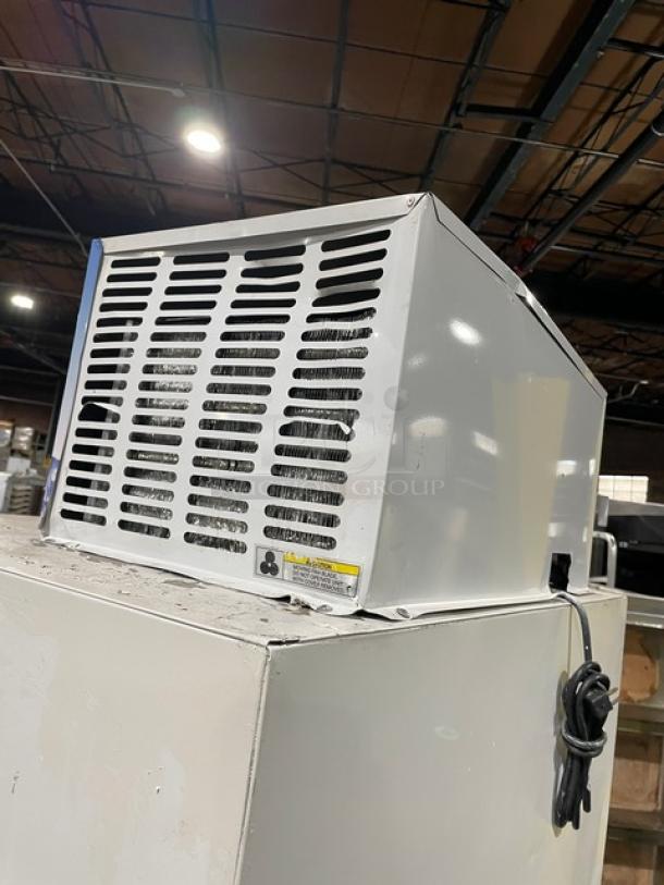 Leer Commercial Ice Merchandiser Freezer, Model 301UC25MG, 115V, white with single glass swing door, indoor use, SN: HAA-0404.