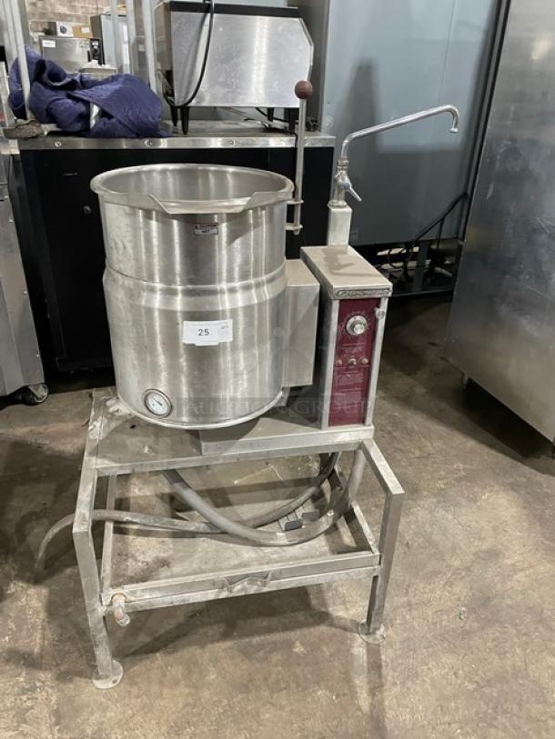 Southbend KECT-10 10-gal. stainless steel tilting steam kettle with swing spout faucet, on legs, single undershelf.