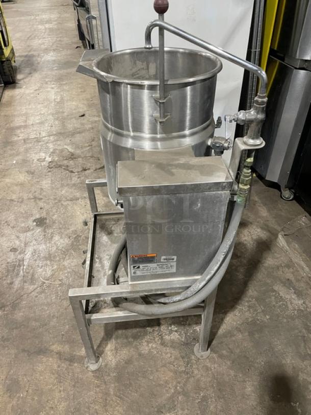 Southbend 10-gal 2/3 jacketed tilting steam kettle, model KECT10, stainless steel, swing spout faucet, on legs with undershelf base.