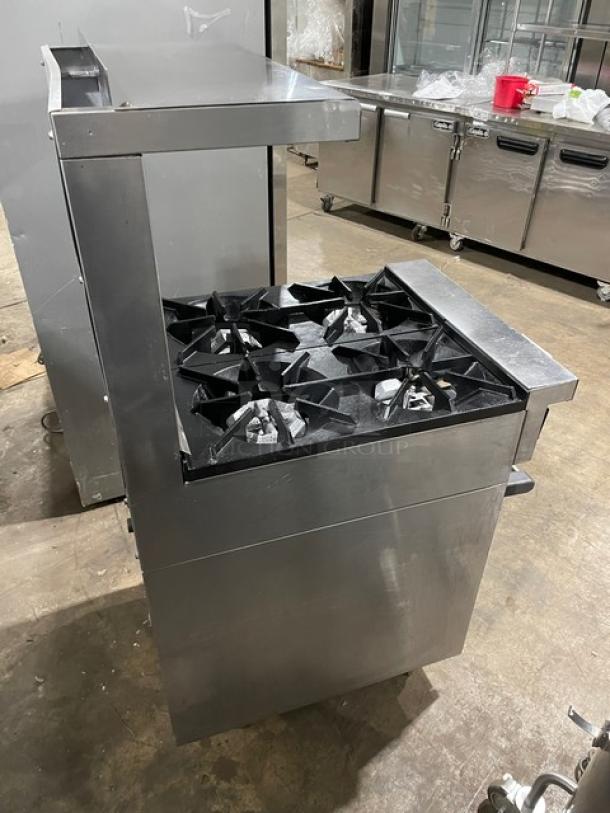 Sunfire stainless steel 4-burner range/oven combo with backsplash, overhead shelf, wired rack, and legs. Natural gas powered.