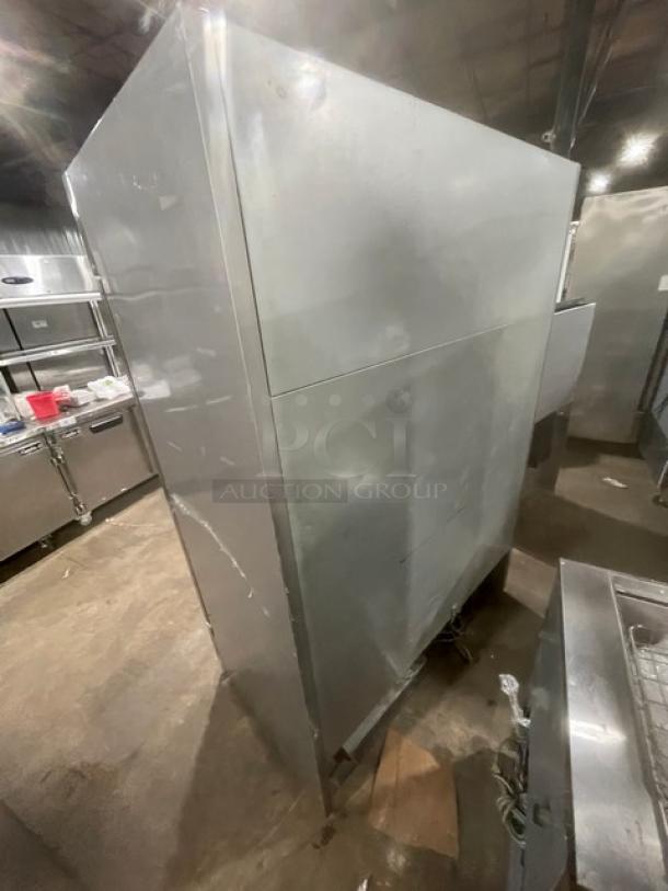 Beverage-Air stainless steel 2-door reach-in freezer, model KF48-1AS, with poly-coated rack. 115V, 1 phase, used condition.